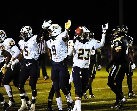 MGCCC'S Malik Thompson (#23) holds the ball after the Bulldog defense forced one of six East Central Turnovers Oct. 24.