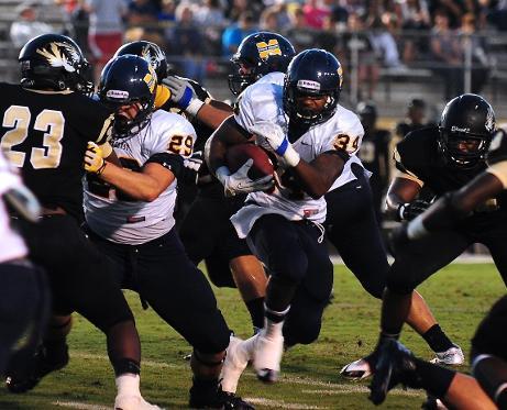 MGCCC fullback Easton Marshall (#29) blocks for RB Antwon Wells (#34), who rushed for 207 yards & 1 TD vs. Northeast Sept. 26.