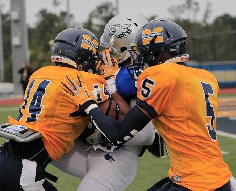 MGCCC'S Justin Evans (left) and Josh Keys clamp down on a Co-Lin player Oct. 19.