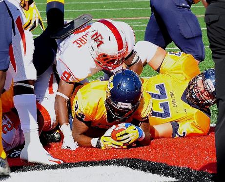 MGCCC'S Antwon Wells (#34) scores on a 3-yard run against East Miss. Nov. 2.