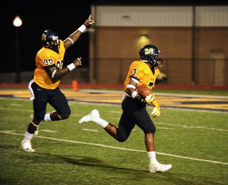 MGCCC'S Maurice Swain (#90) cheers on Trey Wafford during his 33 yard fumble recovery TD vs. Holmes Sept. 5.