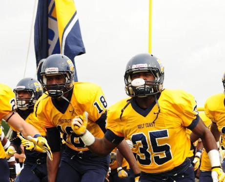 The #7 MGCCC Bulldogs take the field at Homecoming 2013.