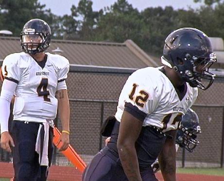MGCCC QB Colton Kane (left) and WR Dhaquille Williams get ready for a play during the scrimmage after Meet The Teams Night Aug. 22.