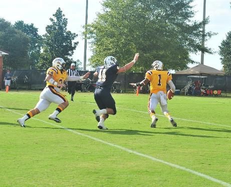 Barron Miller (#44) chases down Pearl River quarterback Kaylon Cooper in a 7-0 win Oct. 11.