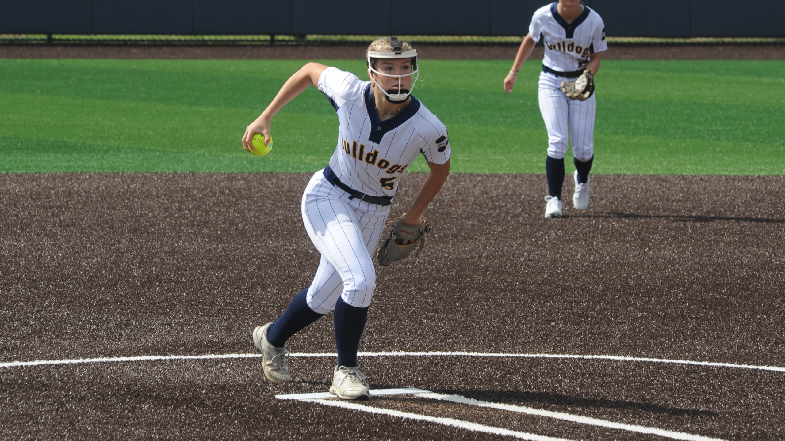 Harrell does it all in softball sweep