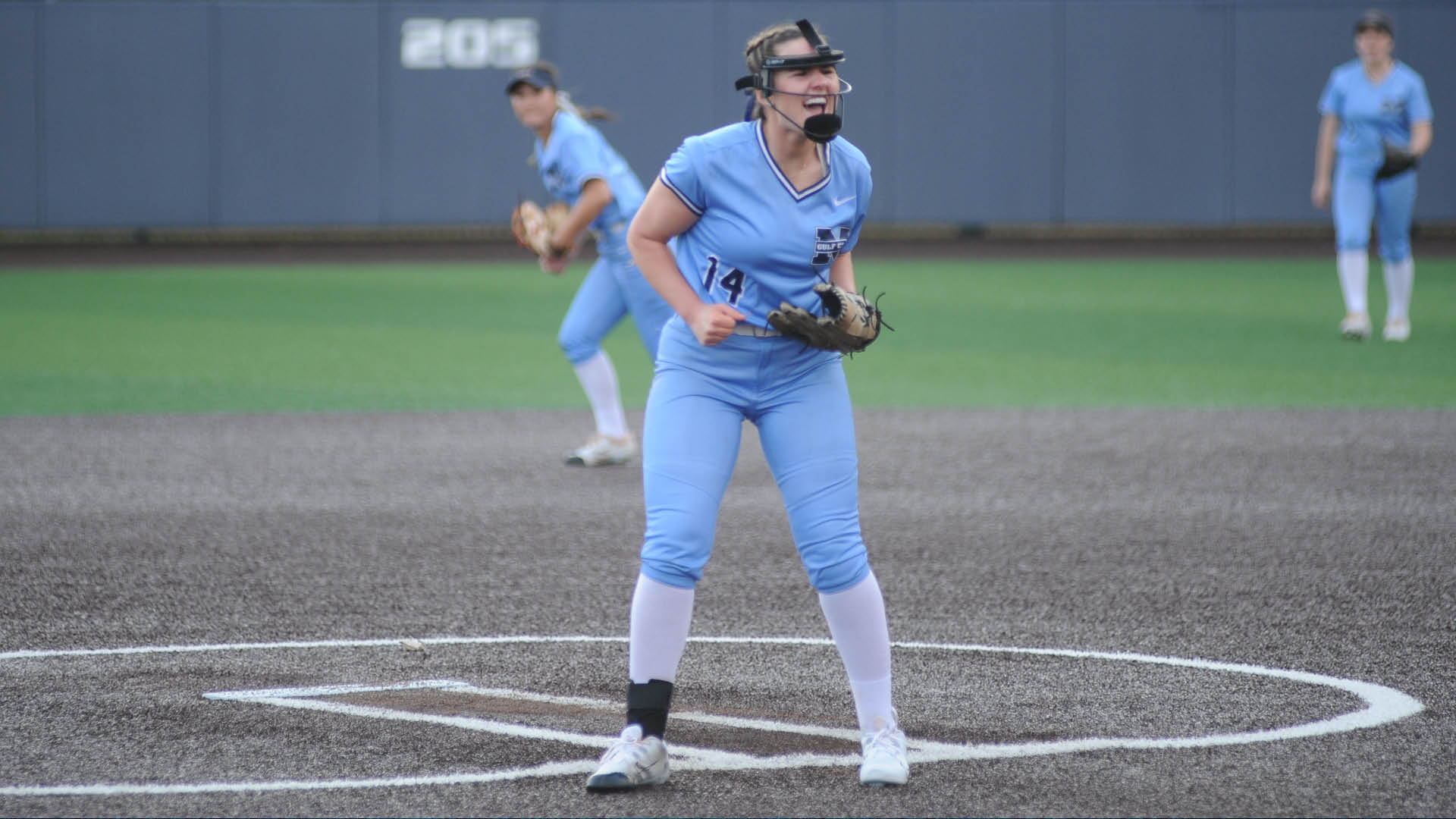 Bulldogs win rain-delayed home opener