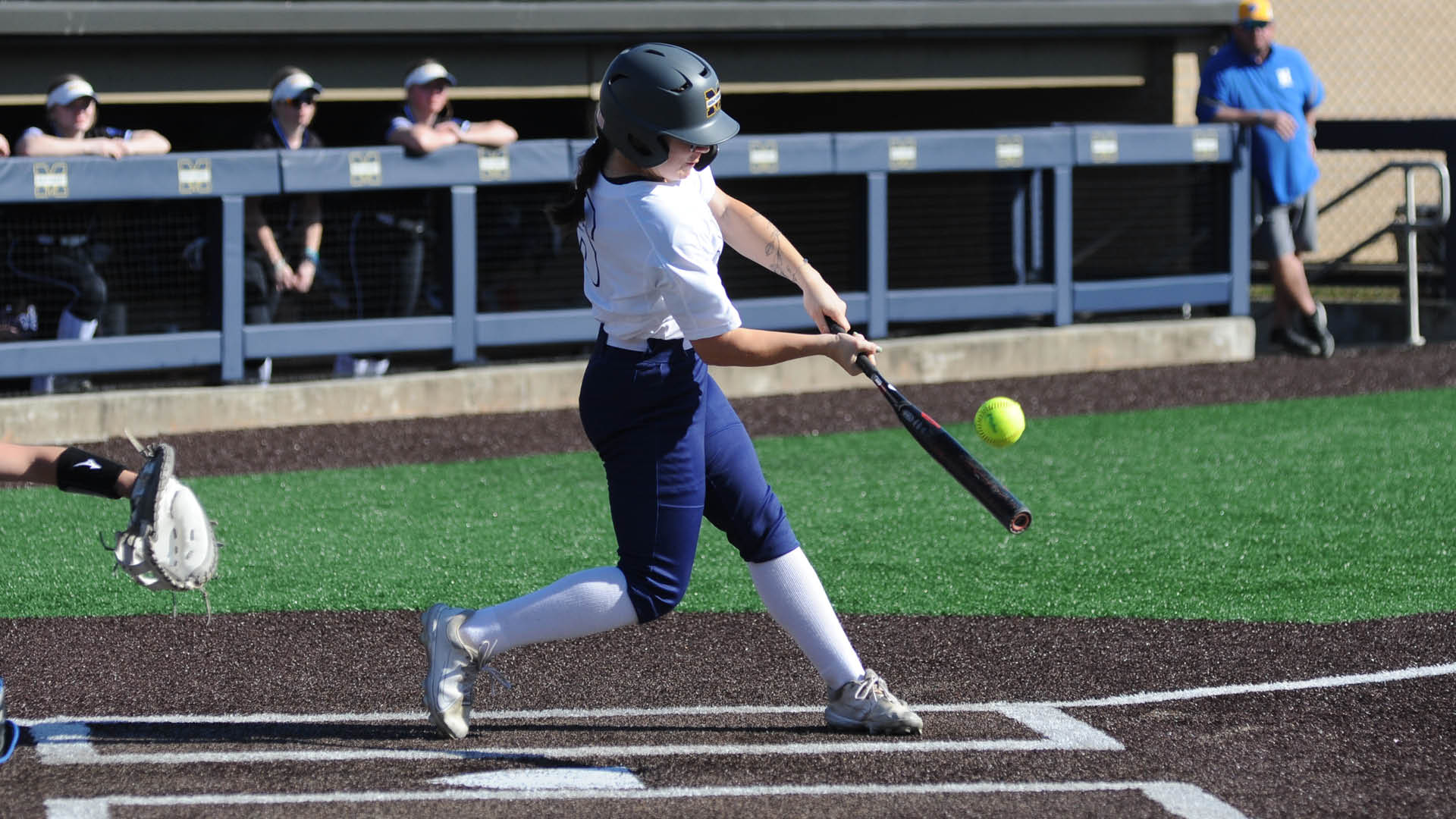 No. 15 Softball splits conference opener